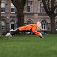 Non-stop Dogwear FJORD Overall Regenmantel mit Beinen orange-schwarz 70